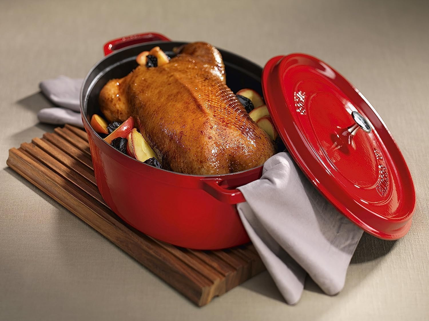 STAUB Cast Iron Dutch Oven 7-qt Oval Cocotte, Made in France, Serves 7-8, Cherry